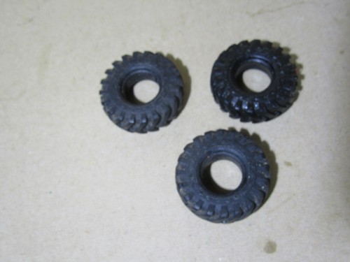 Lot black treaded tires - of,